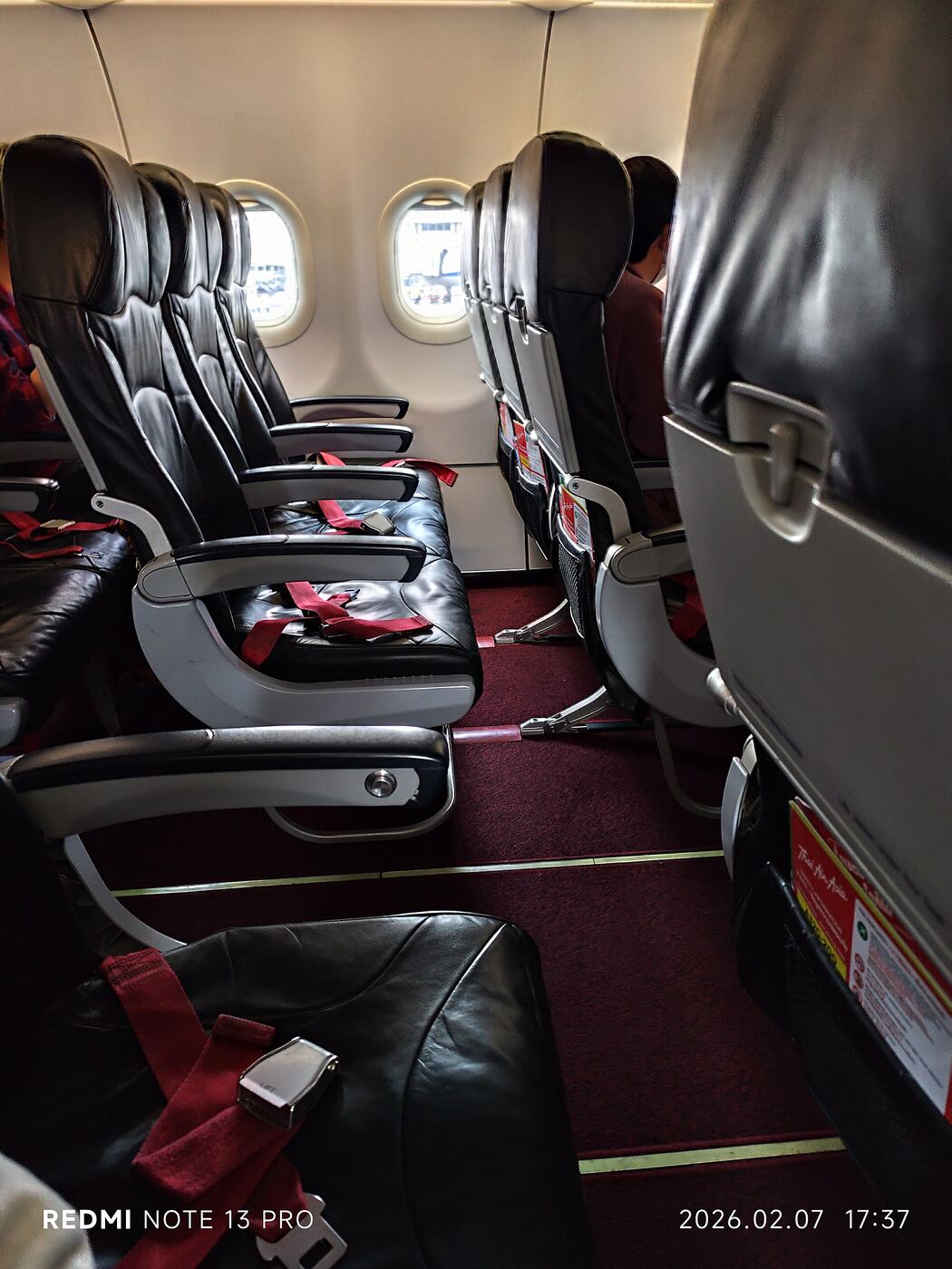 nervous passenger airplane holding armrest